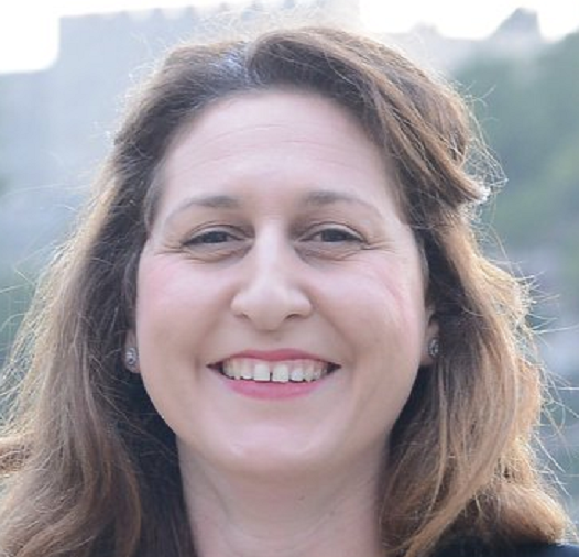 גלית גרינברג הלטאה שמעבירה למשטרות בחול בקשות לעזרה משפטית בינלאומית